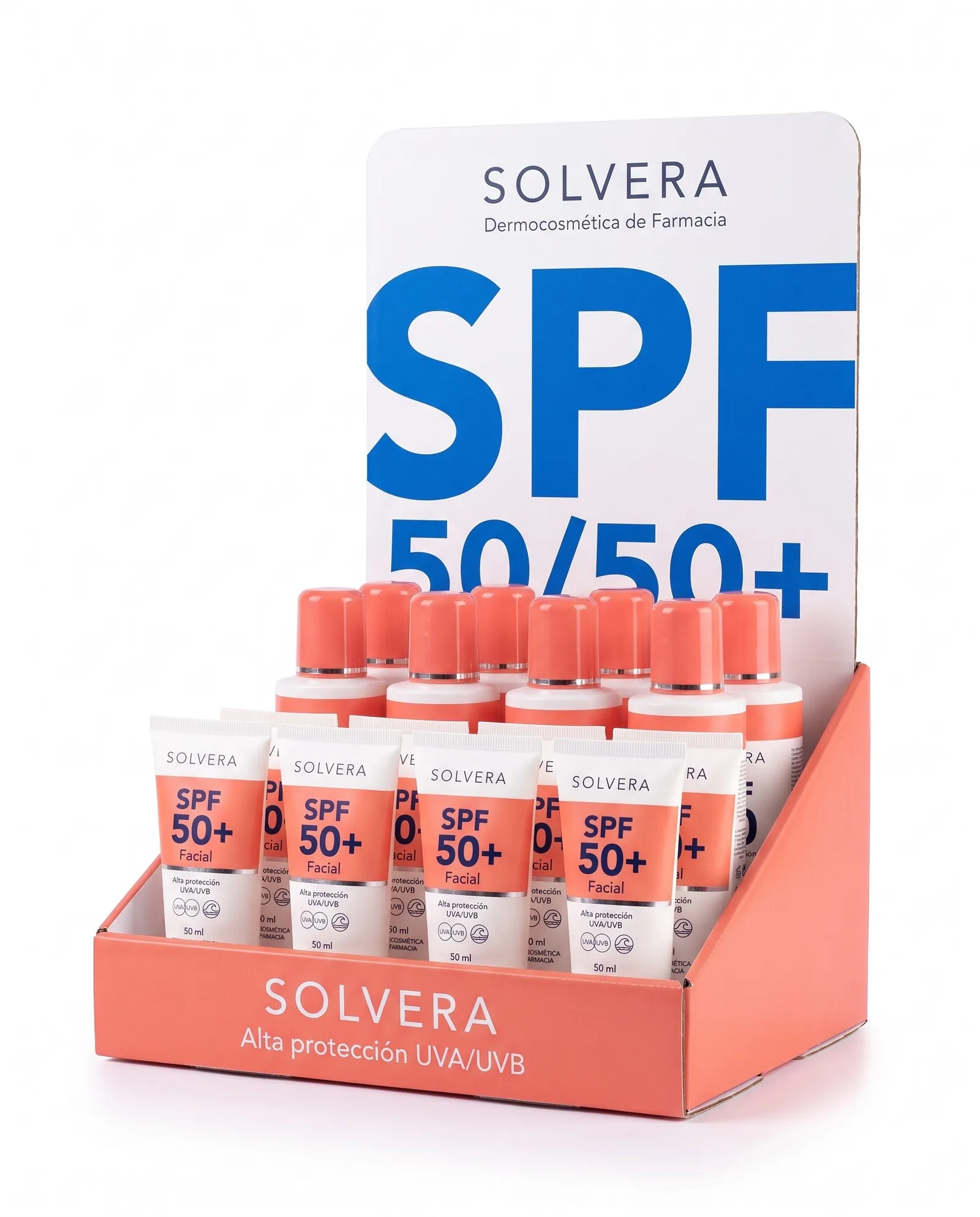 Solvera cardboard counter display with a coral front, face tubes in front, bottles at the back and a white panel with a very large SPF