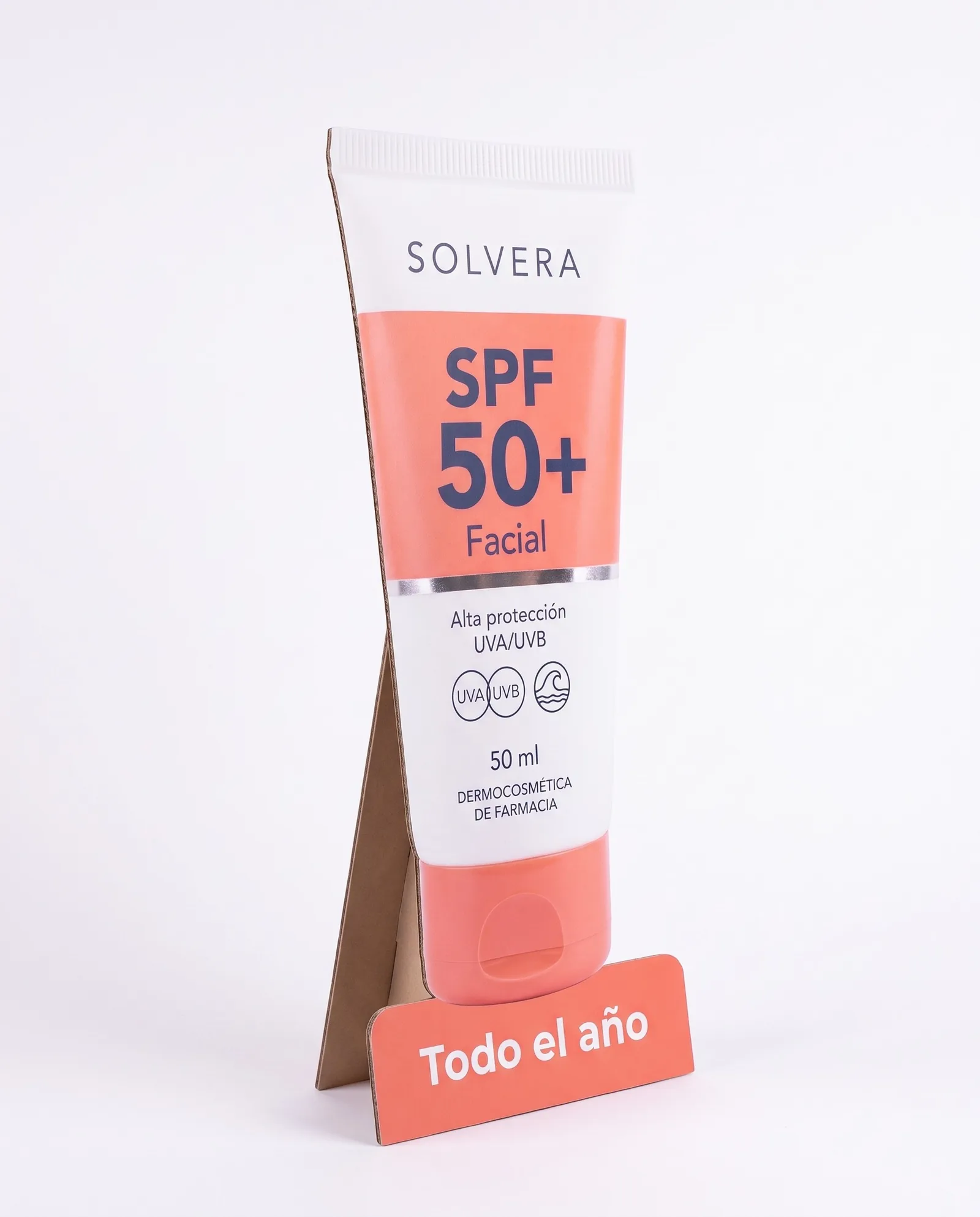 Ficticio de suelo plano de Solvera, una silueta de cartón del tubo facial con pie trasero y una base coral con el texto Todo el año